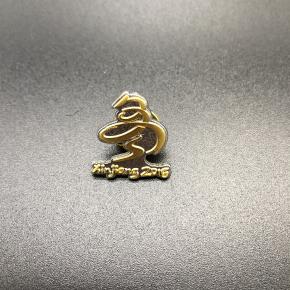 Die struck pin